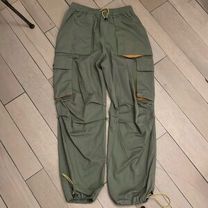 Brain dead parachute cargo pants, yellow accents